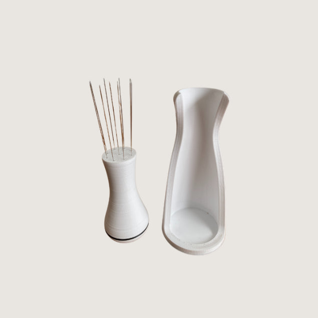 WDT Tool and separate holder shown side by side to display individual components


