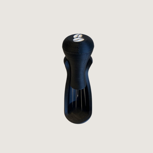 Front view of Black WDT Tool with attached holder for espresso distribution